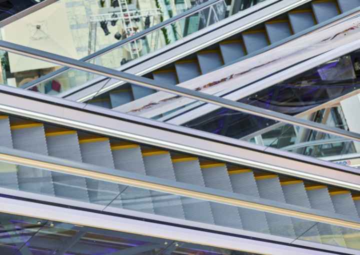 Crisscross escalators