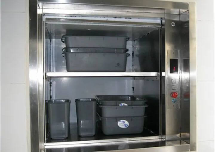 Food boxes are arranged in a Light-duty Dumbwaiter elevator.