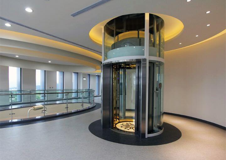 A sophisticated shaftless elevator in a contemporary home.