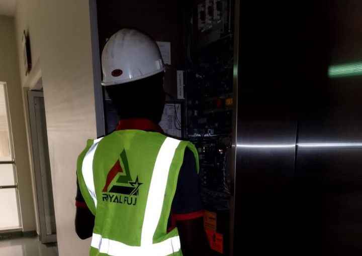 Royal Fuji Elevator staff performing routine maintenance tasks in UAE
