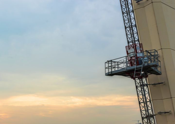 A compact and versatile Single Mast Passenger Hoist Lift from Royal Fuji, providing efficient vertical transportation for various construction and renovation projects.