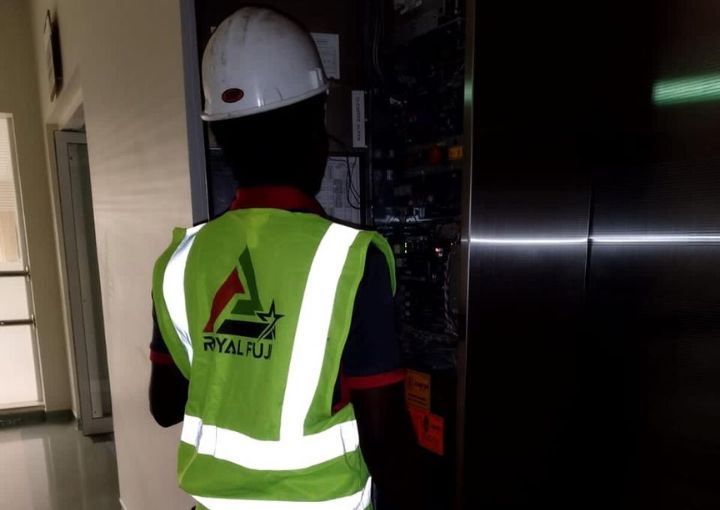 Royal Fuji staff in Dubai performing routine passenger lift maintenance."